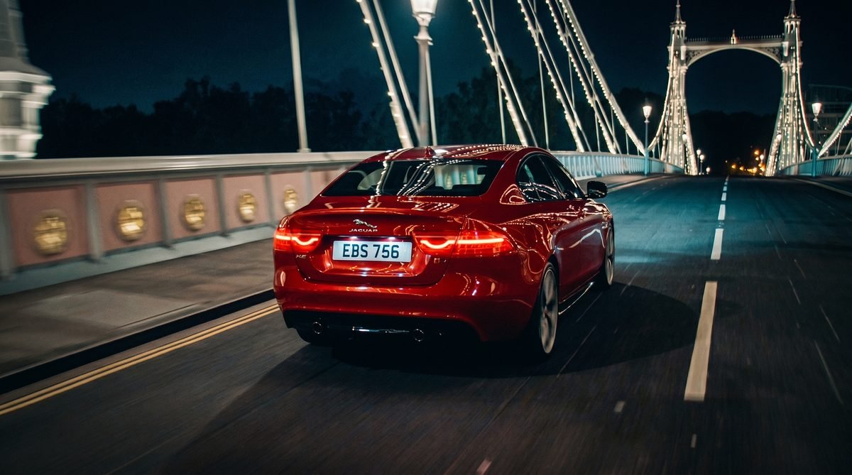Jaguar XE launch — red Jaguar XE on a London bridge at night, Imagination